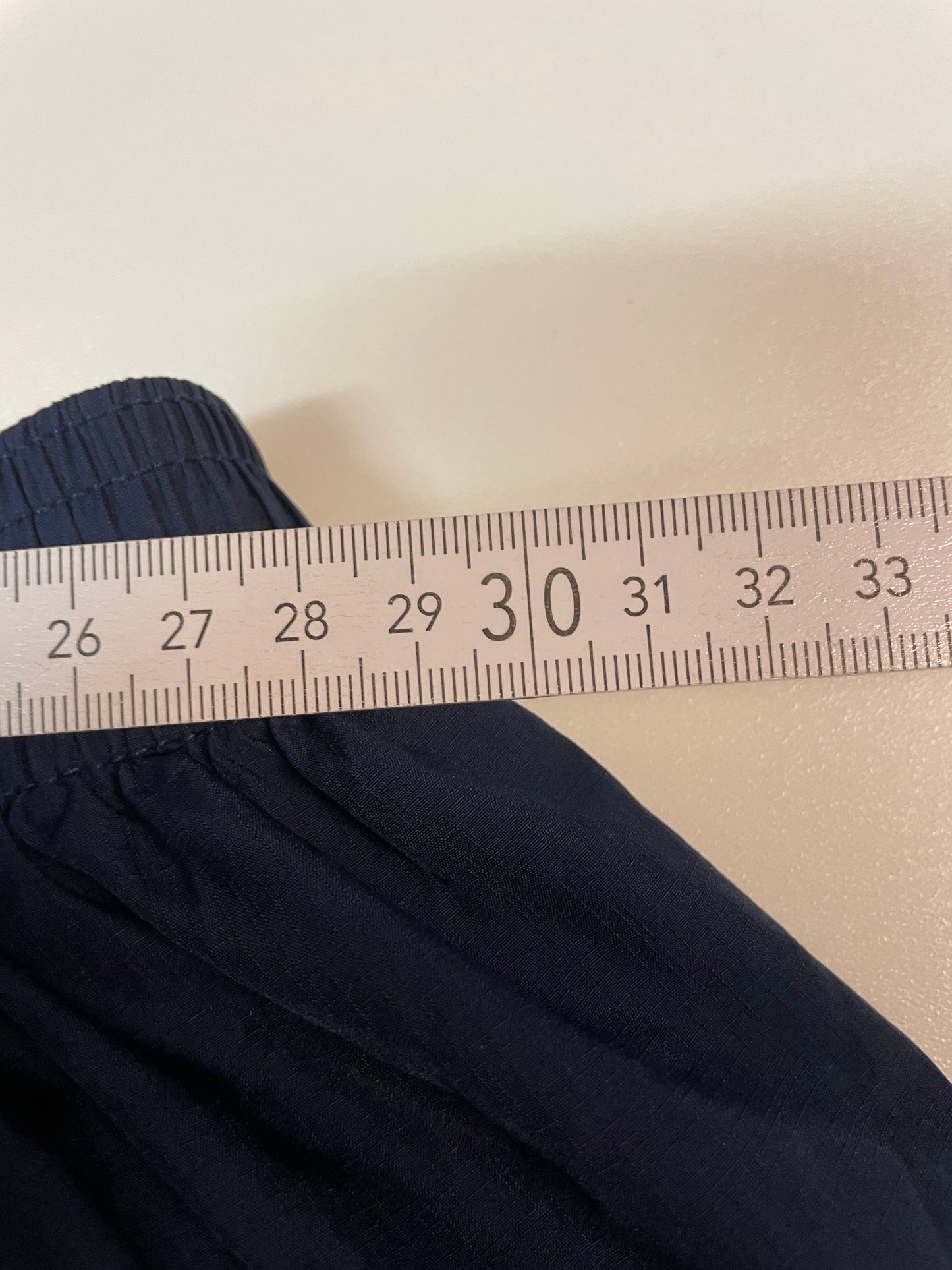 Entdecke unsere Vintage Track Pants von Nike und anderen Marken, erhältlich bei Valuxery.de - Dein Shop für trendige Vintage - Kleidung. Unsere Track Pants sind aus hochwertigen Materialien und
