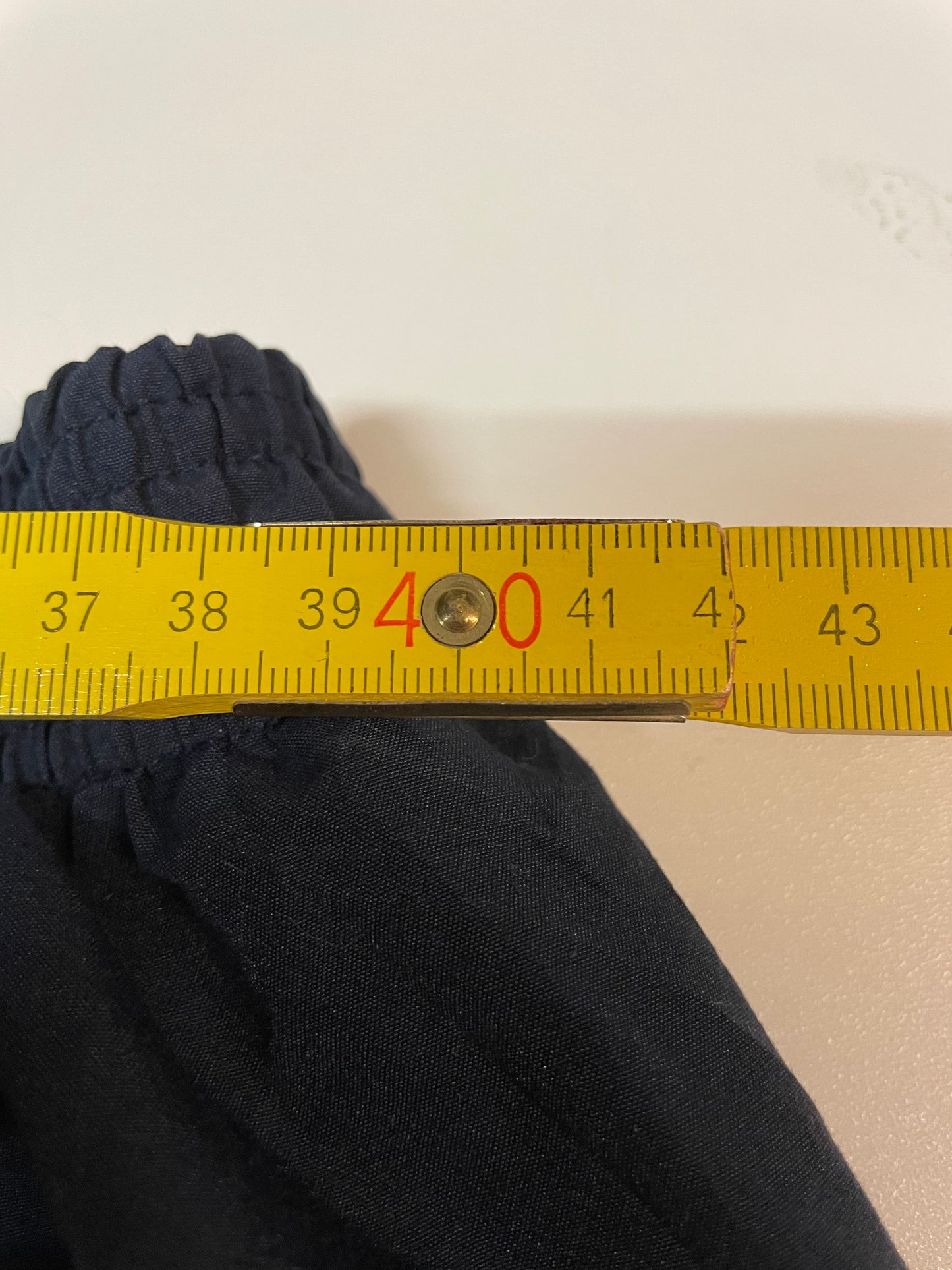 Entdecke unsere Vintage Track Pants von Nike und anderen Marken, erhältlich bei Valuxery.de - Dein Shop für trendige Vintage - Kleidung. Unsere Track Pants sind aus hochwertigen Materialien und