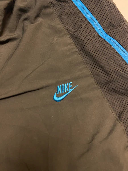 Nike Vintage Trackpants, Baggy, Nylon Stoff aus Regenjacke M 379