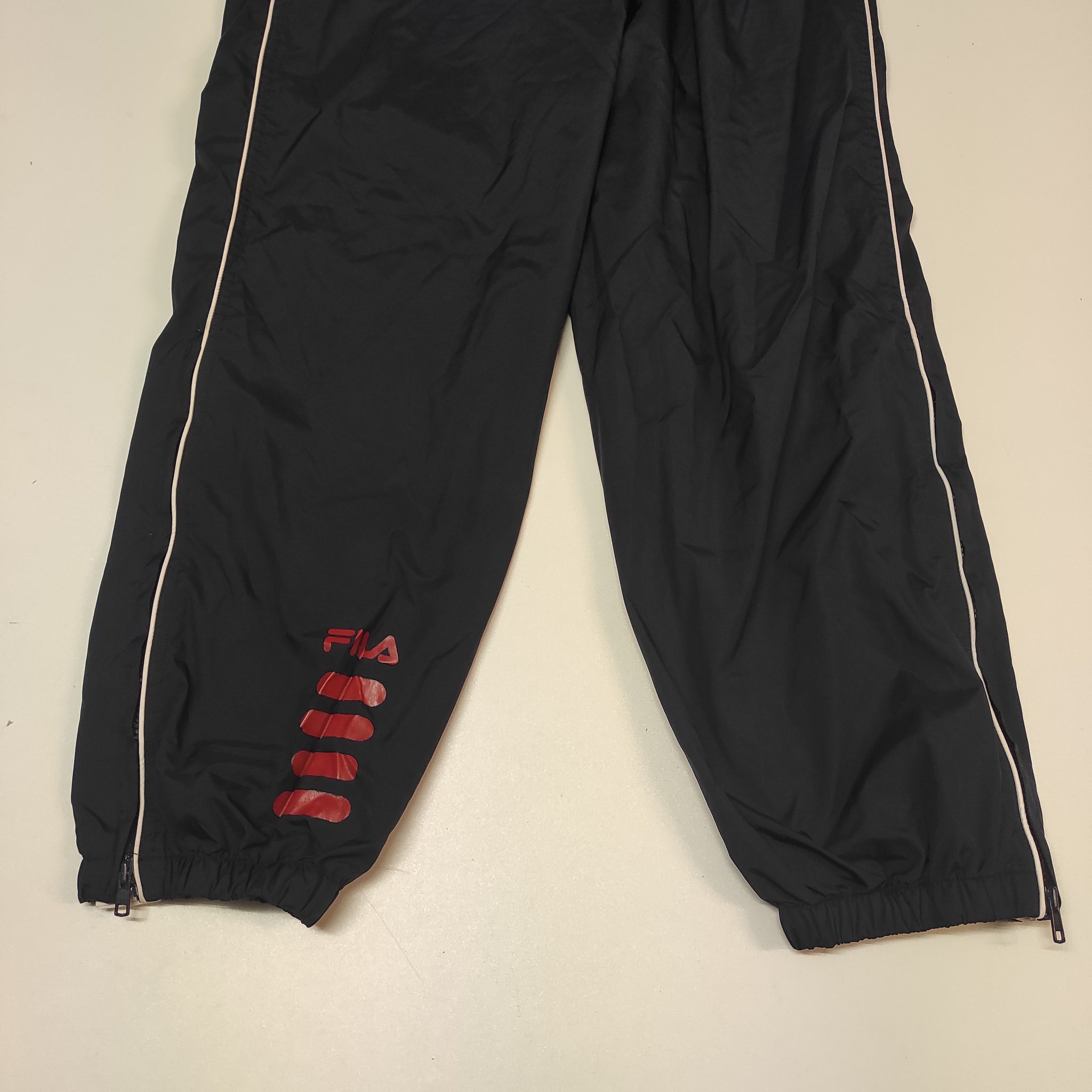 Fila vintage Trackpants L baggy nylon Stoff aus Regenjacke #8776