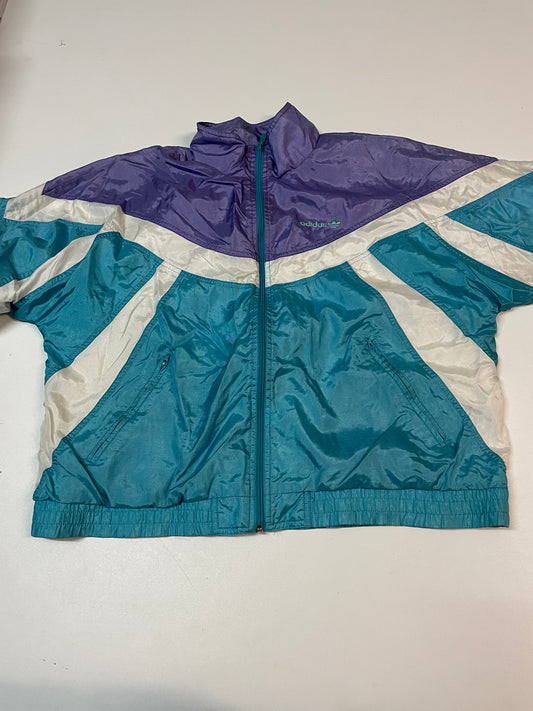 Entdecke unsere Vintage Track Pants von Nike und anderen Marken, erhältlich bei Valuxery.de - Dein Shop für trendige Vintage - Kleidung. Unsere Track Pants sind aus hochwertigen Materialien und