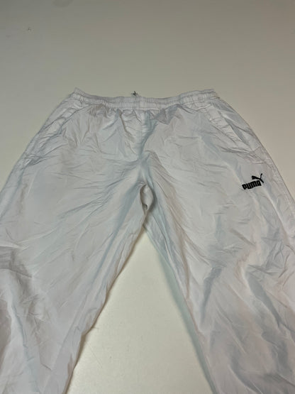 Entdecke unsere Vintage Track Pants von Nike und anderen Marken, erhältlich bei Valuxery.de - Dein Shop für trendige Vintage - Kleidung. Unsere Track Pants sind aus hochwertigen Materialien und