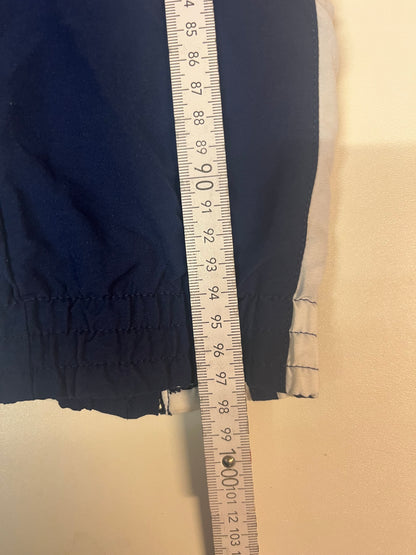 Entdecke unsere Vintage Track Pants von Nike und anderen Marken, erhältlich bei Valuxery.de - Dein Shop für trendige Vintage - Kleidung. Unsere Track Pants sind aus hochwertigen Materialien und