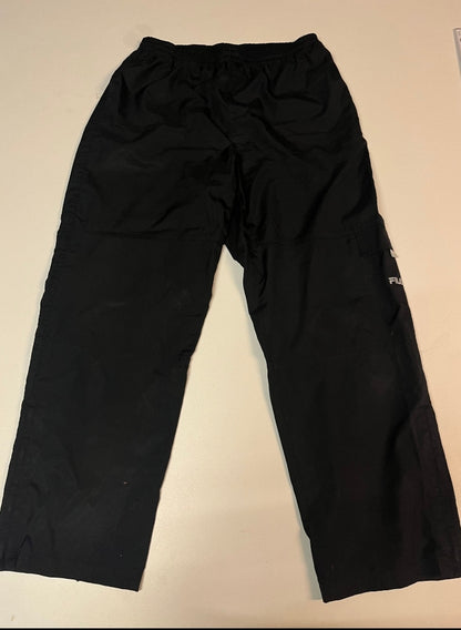 Entdecke unsere Vintage Track Pants von Nike und anderen Marken, erhältlich bei Valuxery.de - Dein Shop für trendige Vintage - Kleidung. Unsere Track Pants sind aus hochwertigen Materialien und