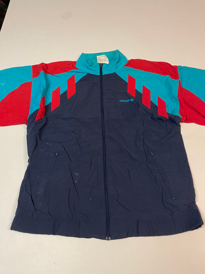 Entdecke unsere Vintage Track Pants von Nike und anderen Marken, erhältlich bei Valuxery.de - Dein Shop für trendige Vintage - Kleidung. Unsere Track Pants sind aus hochwertigen Materialien und