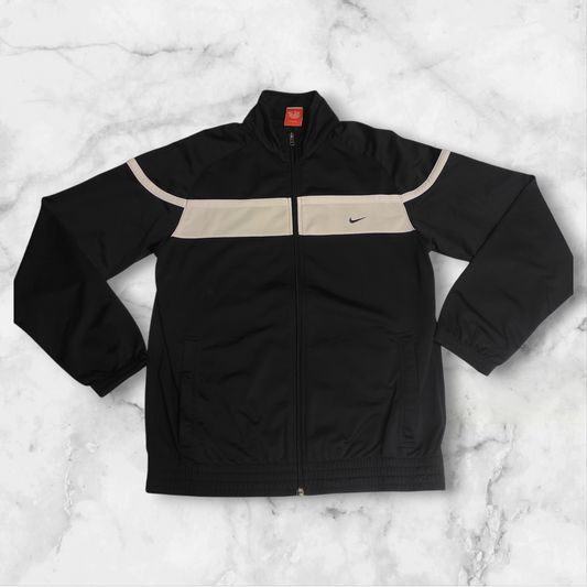 Entdecke unsere Vintage Track Pants von Nike und anderen Marken, erhältlich bei Valuxery.de - Dein Shop für trendige Vintage - Kleidung. Unsere Track Pants sind aus hochwertigen Materialien und