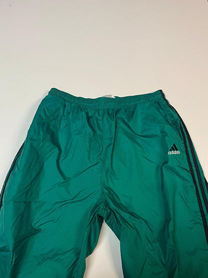 Entdecke unsere Vintage Track Pants von Nike und anderen Marken, erhältlich bei Valuxery.de - Dein Shop für trendige Vintage - Kleidung. Unsere Track Pants sind aus hochwertigen Materialien und
