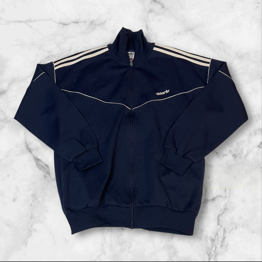 Entdecke unsere Vintage Track Pants von Nike und anderen Marken, erhältlich bei Valuxery.de - Dein Shop für trendige Vintage - Kleidung. Unsere Track Pants sind aus hochwertigen Materialien und