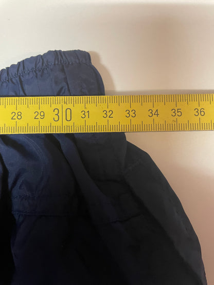 Entdecke unsere Vintage Track Pants von Nike und anderen Marken, erhältlich bei Valuxery.de - Dein Shop für trendige Vintage - Kleidung. Unsere Track Pants sind aus hochwertigen Materialien und