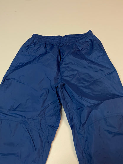 Entdecke unsere Vintage Track Pants von Nike und anderen Marken, erhältlich bei Valuxery.de - Dein Shop für trendige Vintage - Kleidung. Unsere Track Pants sind aus hochwertigen Materialien und