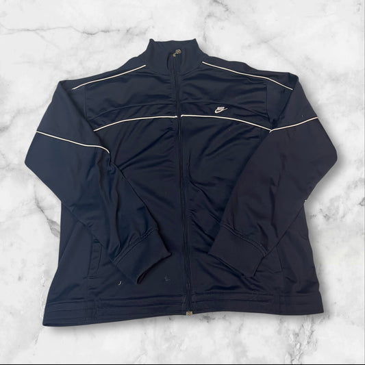 Entdecke unsere Vintage Track Pants von Nike und anderen Marken, erhältlich bei Valuxery.de - Dein Shop für trendige Vintage - Kleidung. Unsere Track Pants sind aus hochwertigen Materialien und