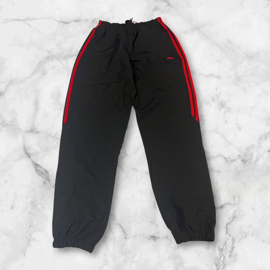 Entdecke unsere Vintage Track Pants von Nike und anderen Marken, erhältlich bei Valuxery.de - Dein Shop für trendige Vintage - Kleidung. Unsere Track Pants sind aus hochwertigen Materialien und
