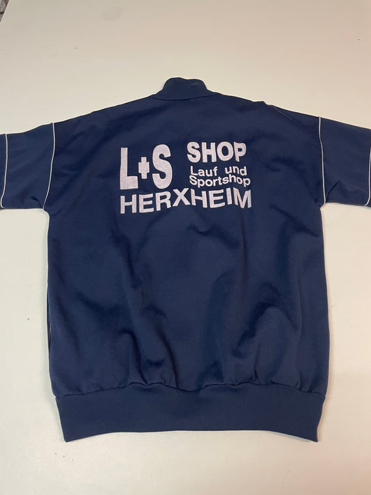 Entdecke unsere Vintage Track Pants von Nike und anderen Marken, erhältlich bei Valuxery.de - Dein Shop für trendige Vintage - Kleidung. Unsere Track Pants sind aus hochwertigen Materialien und