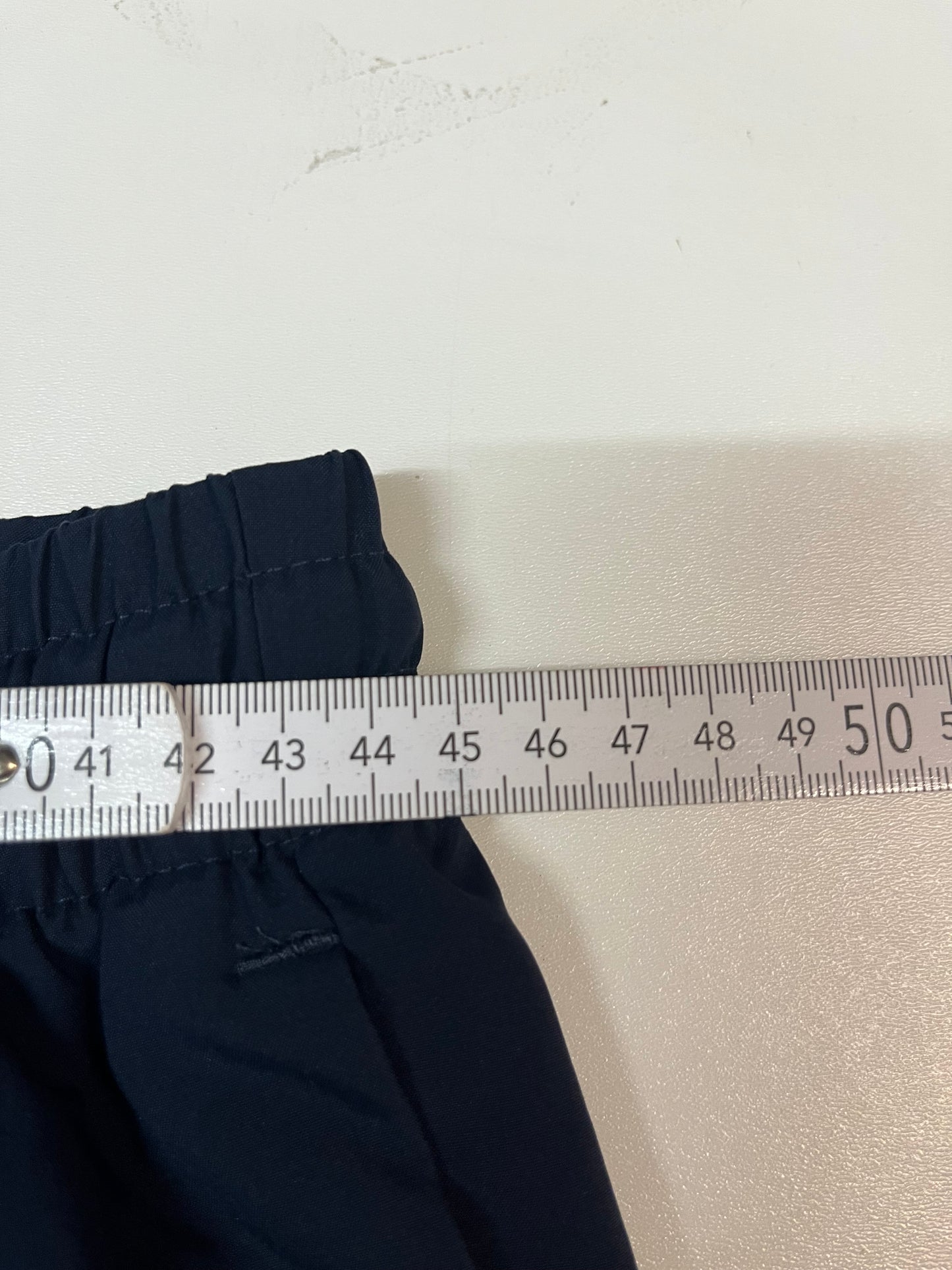 Entdecke unsere Vintage Track Pants von Nike und anderen Marken, erhältlich bei Valuxery.de - Dein Shop für trendige Vintage - Kleidung. Unsere Track Pants sind aus hochwertigen Materialien und