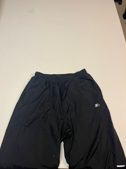 Entdecke unsere Vintage Track Pants von Nike und anderen Marken, erhältlich bei Valuxery.de - Dein Shop für trendige Vintage - Kleidung. Unsere Track Pants sind aus hochwertigen Materialien und