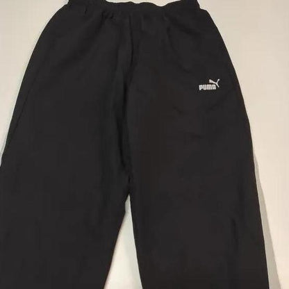 Entdecke unsere Vintage Track Pants von Nike und anderen Marken, erhältlich bei Valuxery.de - Dein Shop für trendige Vintage - Kleidung. Unsere Track Pants sind aus hochwertigen Materialien und