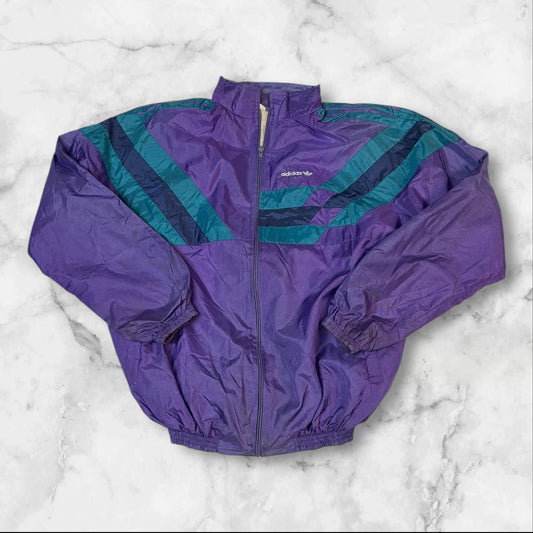 Entdecke unsere Vintage Track Pants von Nike und anderen Marken, erhältlich bei Valuxery.de - Dein Shop für trendige Vintage - Kleidung. Unsere Track Pants sind aus hochwertigen Materialien und