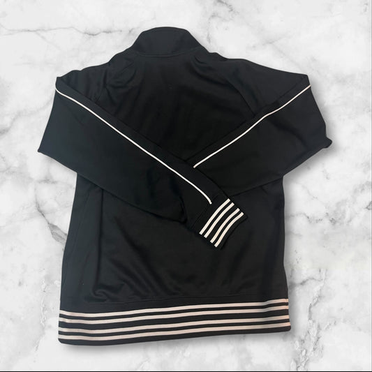 Entdecke unsere Vintage Track Pants von Nike und anderen Marken, erhältlich bei Valuxery.de - Dein Shop für trendige Vintage - Kleidung. Unsere Track Pants sind aus hochwertigen Materialien und