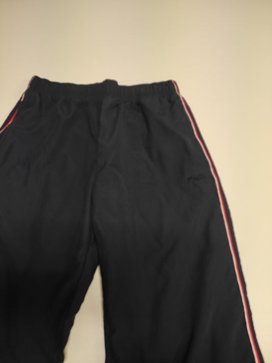 Entdecke unsere Vintage Track Pants von Nike und anderen Marken, erhältlich bei Valuxery.de - Dein Shop für trendige Vintage - Kleidung. Unsere Track Pants sind aus hochwertigen Materialien und